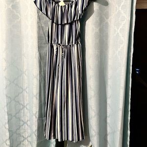 Girls one piece jump suit only worn long enough to try one.